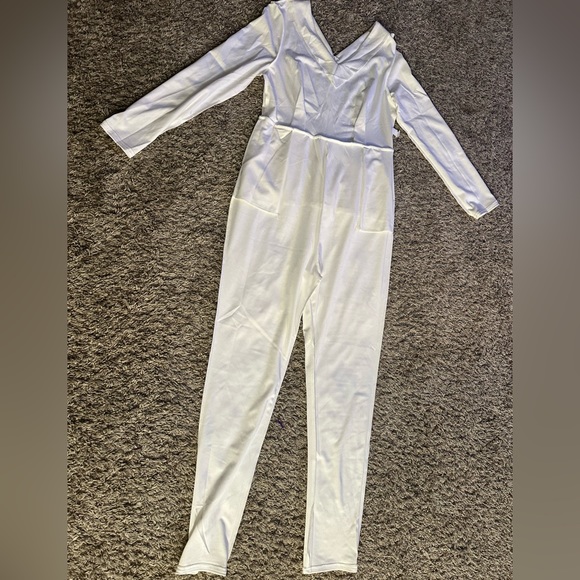 PEPLUM ONE PIECE JUMPSUIT WITH SIDE POCKETS. - Picture 8 of 13
